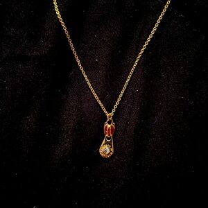 Marc Jacob’s zipper necklace gold